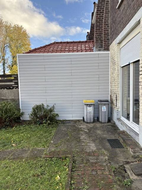 Création complète d’une descente de gouttière en zinc sur extension avec raccordement discret et évacuation optimisée à Tourcoing et ses environs
